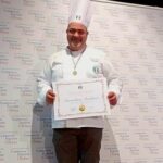 Campi Bisenzio (Firenze): campionati italiani di cucina AIC: Presente la Calabria, Simonluca Barbieri  riceve la medaglia d’oro per i successi ottenuti. Medaglia d’oro anche per la junior chef Francesca Marino
